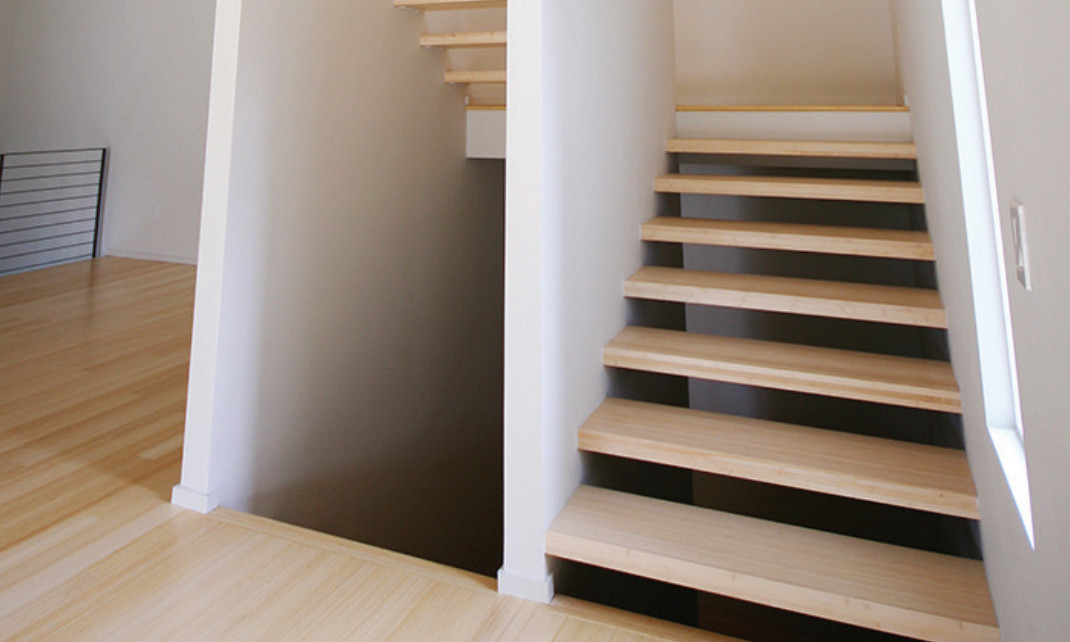 Private residence's staircase featuring Plyboo edge grain