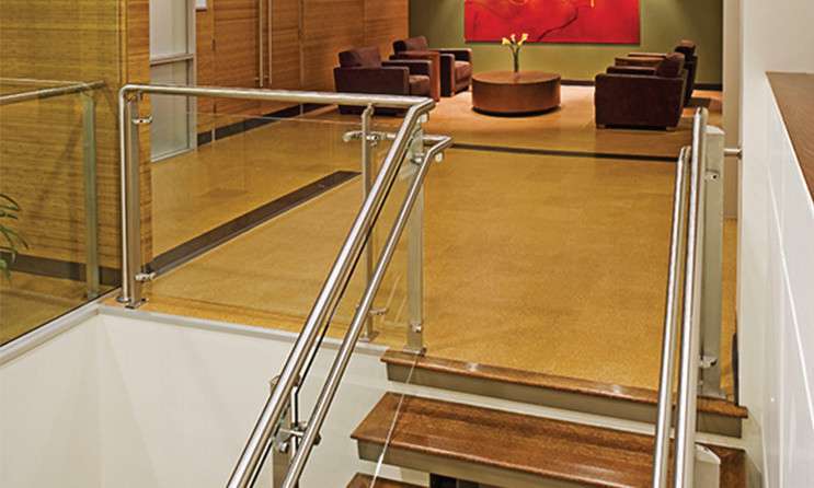 Desk and lobby area with wall paneling and flooring at Cervantes/Geronimo