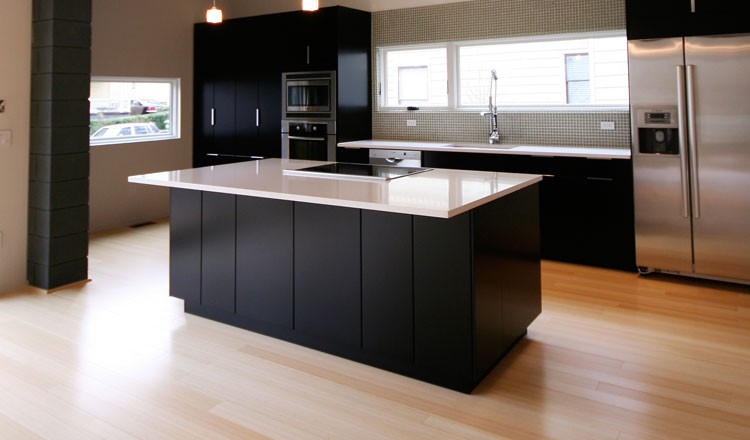 Private residence's kitchen featuring Plyboo edge grain