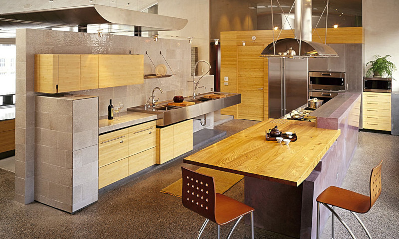 Kitchen at Natoma Loft featuring natural flat grain material for cabinetry